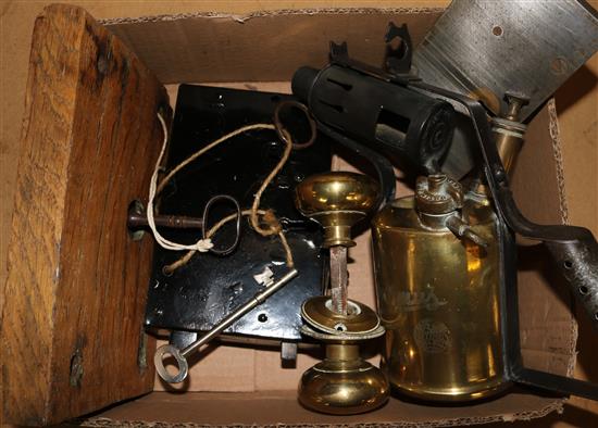 Box of assorted locks and a brass blowlamp